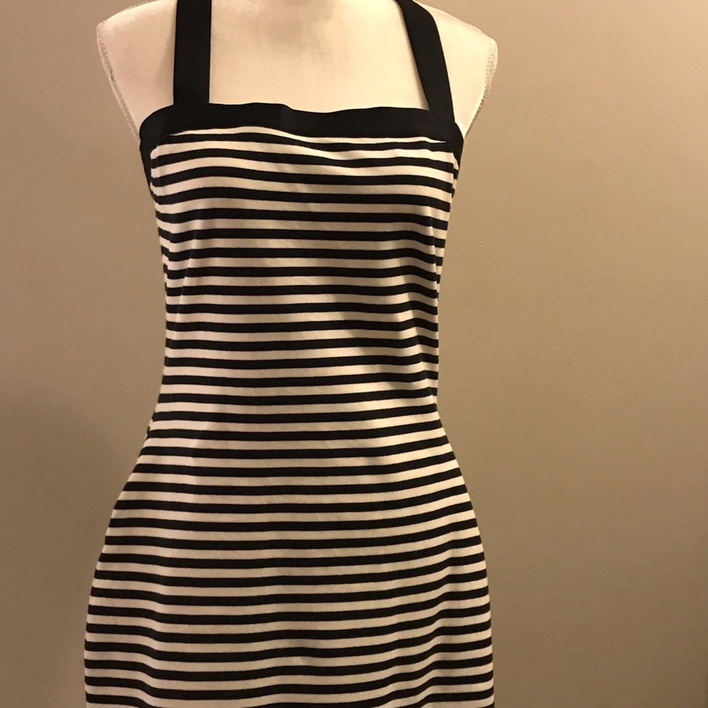 Beach ready criss-cross back, striped minidress.